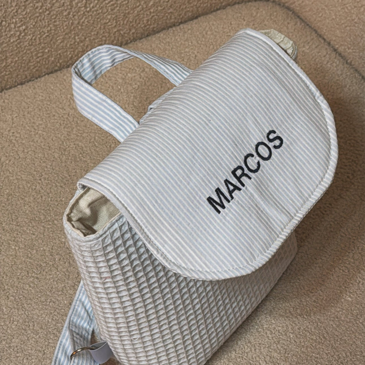 Mochila interior plastificado