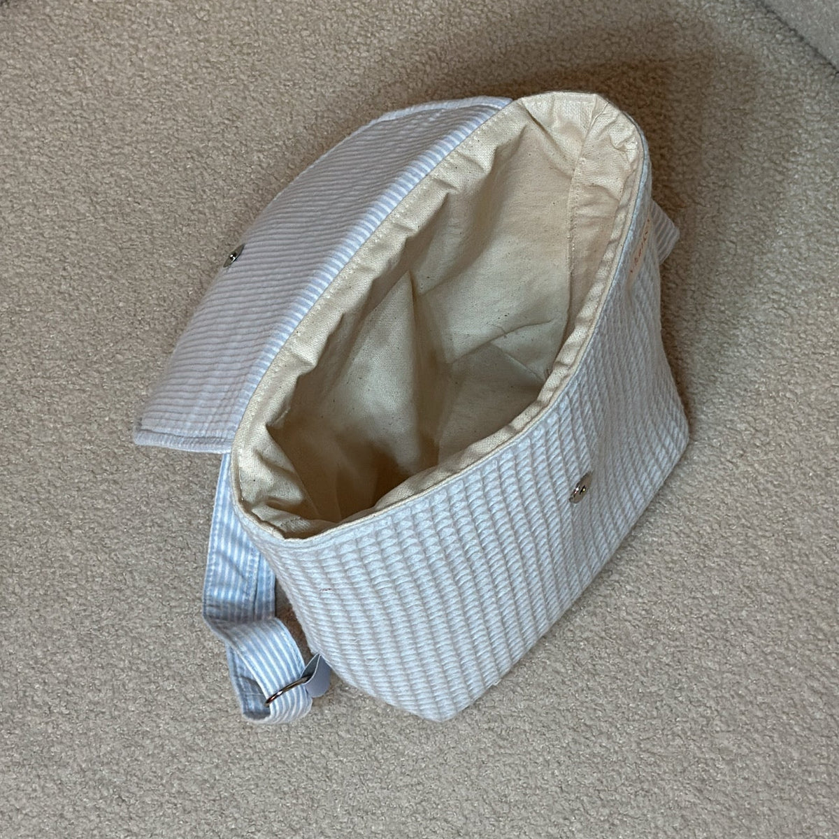 Mochila interior plastificado